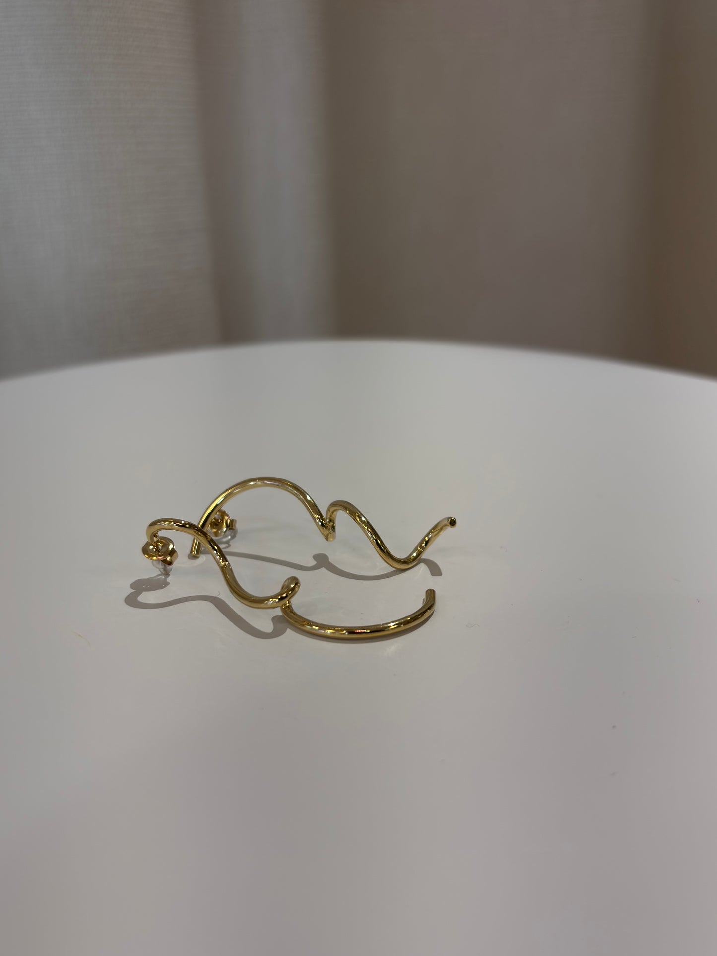 Wellige Steckohrringe